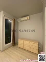 Modern minimalist bedroom with air conditioner and wooden cabinet