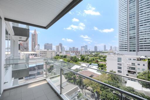 Spacious balcony with cityscape view in a modern apartment