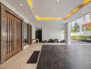 Modern lobby entrance of a residential building with sleek design and elegant lighting