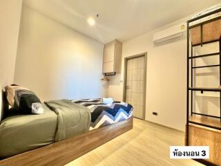 Contemporary bedroom with a loft bed and minimalist design