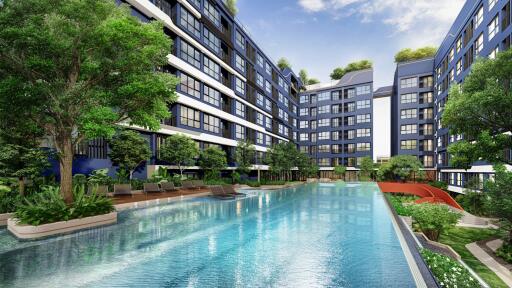 Modern residential complex with a large swimming pool surrounded by lush greenery