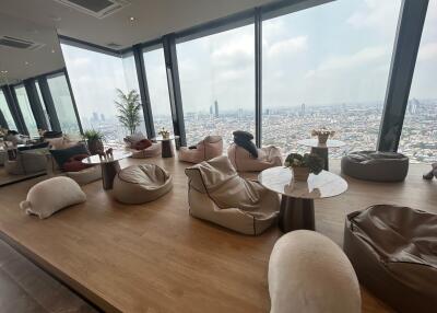 High-rise lounge area with panoramic city views