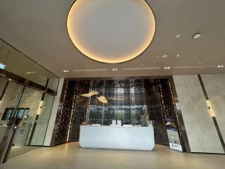 Modern lobby interior with elegant desk and stylish lighting