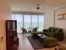 Spacious living room with ocean view and ample natural light