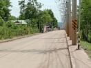 Street view near the property with surrounding greenery and residential area