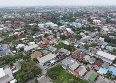 Aerial view of a residential area showing various houses and buildings