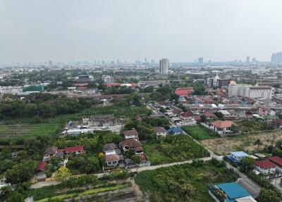Aerial view of a residential area showing mixed housing and green spaces