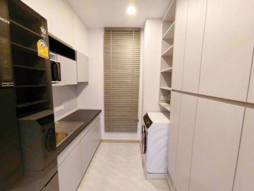 Modern kitchen with built-in appliances and ample storage