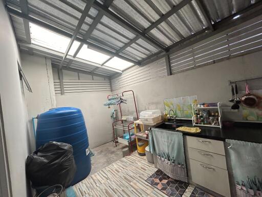 Spacious garage with storage and utility area