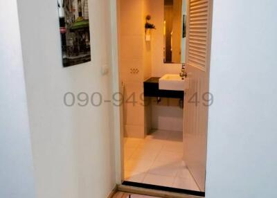 Elegant bathroom with well-lit vanity and modern design