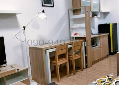 Compact living room with integrated kitchenette