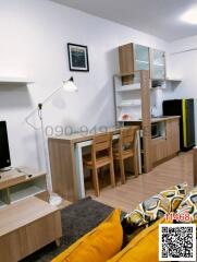 Compact living room with integrated kitchenette