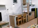 Compact living room with integrated kitchenette