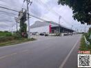 Exterior view of industrial building with parking lot