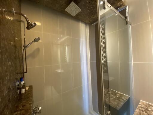Modern bathroom with spacious glass shower enclosure