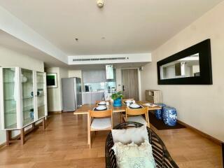 Spacious and modern living room with kitchen and dining area