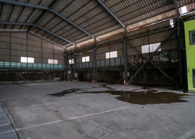 Spacious empty industrial warehouse interior