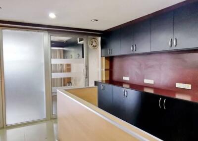 Modern kitchen with wooden cabinets and ample storage space