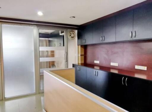 Modern kitchen with wooden cabinets and ample storage space