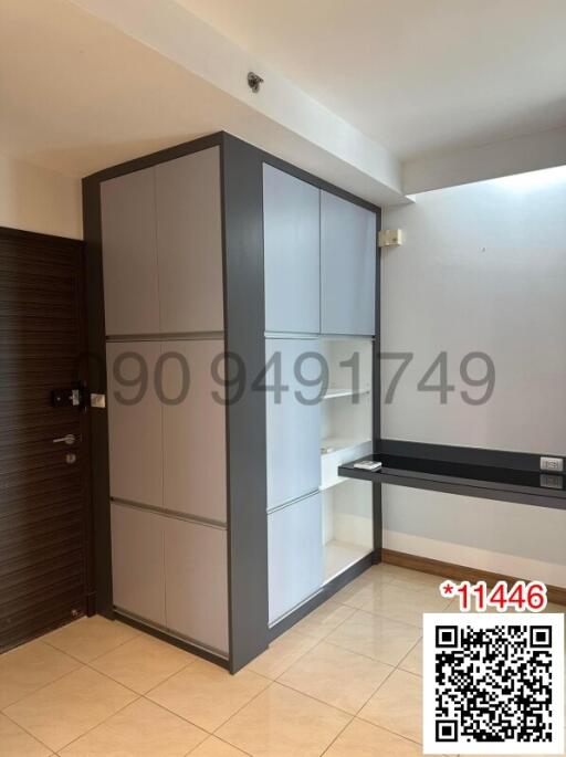Modern bedroom with built-in wardrobe and study area