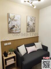 Cozy modern living room with sofa and decorative wall art