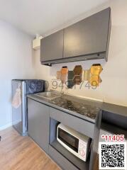 Compact modern kitchen with updated appliances