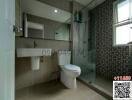 Modern bathroom with shower and neutral tiles