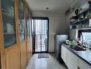 Compact urban kitchen with natural lighting