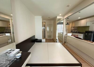 Modern kitchen with integrated living space in a contemporary apartment