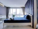 Elegant bedroom with modern design and city view