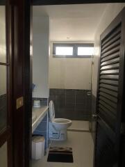 Modern bathroom with natural light and sleek fixtures