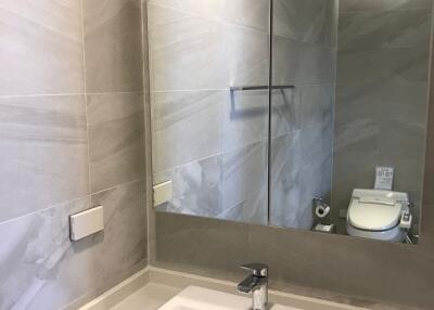 Modern bathroom interior with marble tiles