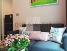 Cozy and well-furnished living room with floral decorations