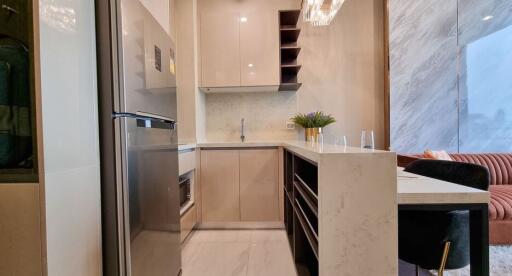 Modern kitchen with marble finish and open plan layout