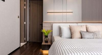 Elegant modern bedroom with neutral tones and stylish decor