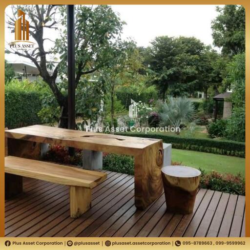 Tranquil garden with wooden bench and lush greenery