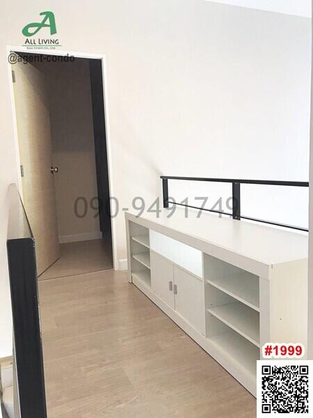 Modern minimalist living room with white storage cabinets