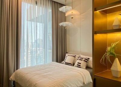 Modern bedroom with sleek design and bright lighting