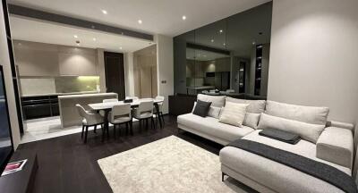 Modern open plan living room with integrated dining area and kitchen