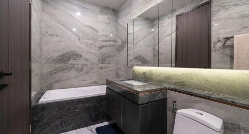 Modern bathroom with marble finish and luxurious fixtures