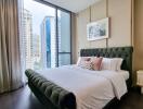 Modern bedroom with a city view through large windows