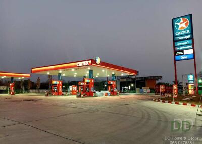 Well-lit Caltex gas station during dusk