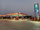 Well-lit Caltex gas station during dusk