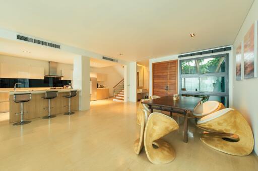 Spacious modern living area with kitchen, dining and relaxation space