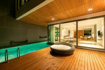 Luxurious home with indoor pool and elegant wooden decking