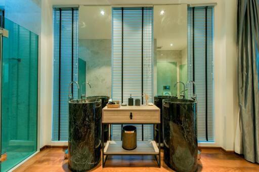 Modern bathroom with dual vessel sinks and stylish decor