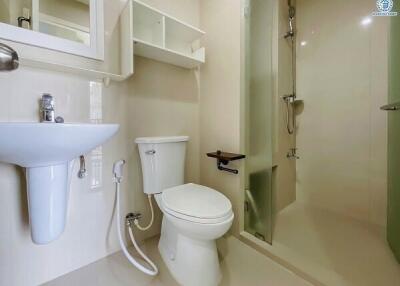modern bathroom with shower, toilet, and sink