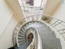 Elegant spiral staircase with modern design in a bright interior space