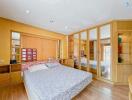 Spacious and well-lit bedroom with ample storage