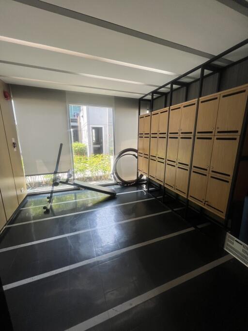 Modern storage room with lockers and exercise equipment